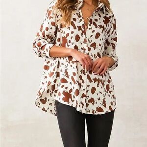 Ladies Cow print shirt. Size large